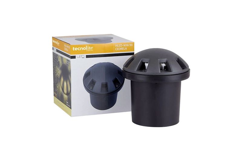 Luminaria empotrar piso LED Cedrela 8 W 400 lm 3000 K IP65 Tecnolite, producto negro junto a su caja blanca y amarilla