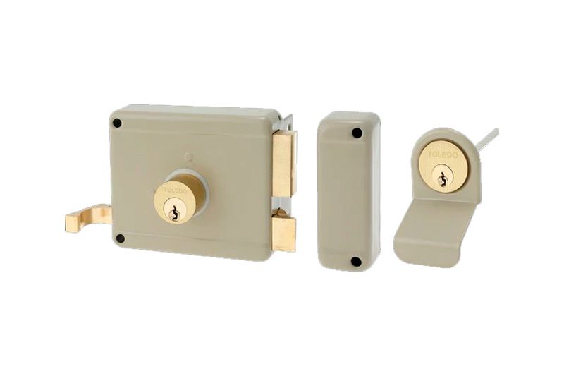 Cerradura parche 60 mm Toledo metal/madera cilindro fijo derecha, cuerpo y tapa en color beige con cilindro dorado