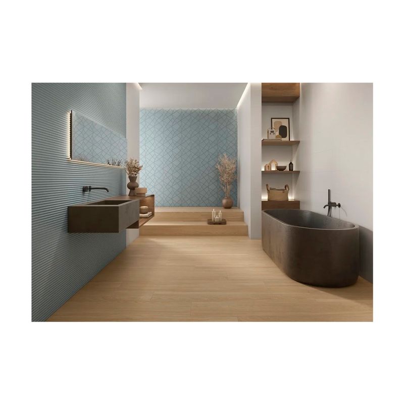 Azulejo 30x90 Miyako Art azul mate rect Keraben, aplicado en pared de baño con diseño geométrico