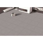 Porcelanato 60x60 Rock Grey mate Casciano, colocado en el piso de una sala moderna con muebles blancos