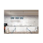 Porcelanato 120x120 Gold Calacatta súper brillante Sunheart, aplicado en paredes y mostrador de una oficina moderna
