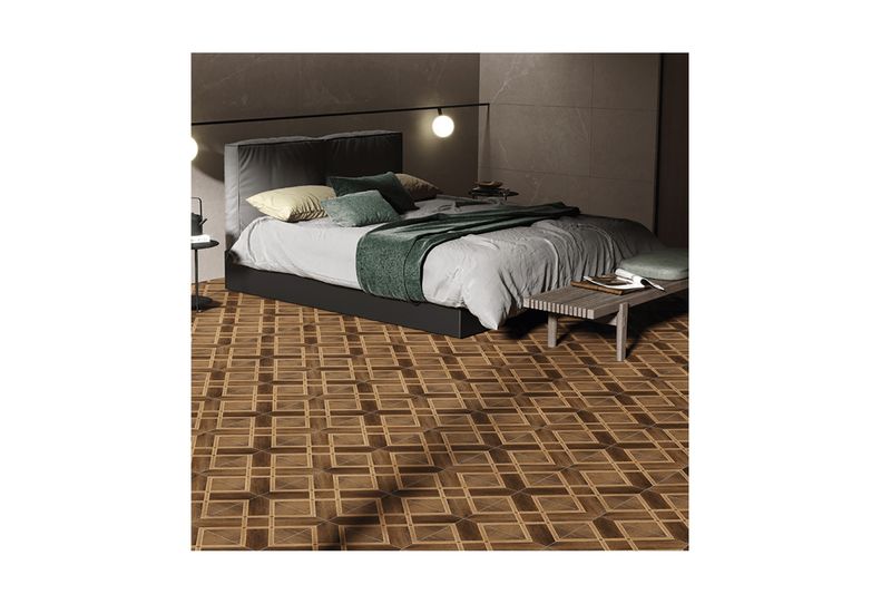 Baldosa 36x36 Narby FDX café madera Geo Porcelanite, instalada en el piso de una habitación con cama y muebles modernos