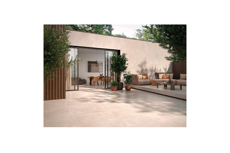 Porcelanato 100 x 100 beige Amira Evolution mate rect Emotion Cerámicas, instalado en piso de terraza exterior