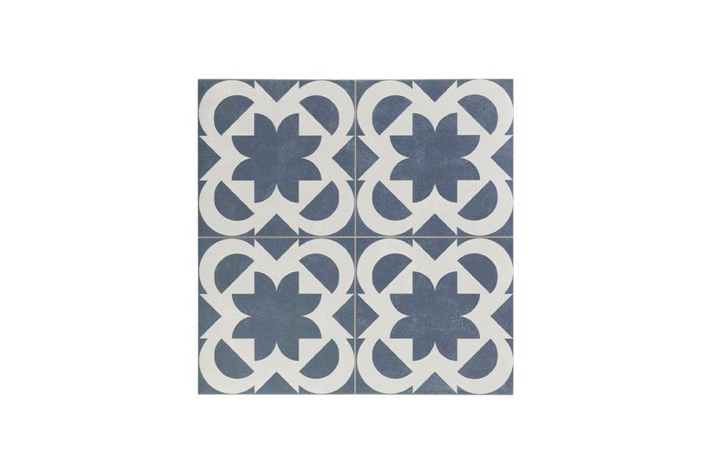 Porcelanato 44.2 x 44.2 gres hidráulico Fez Blue 44 Realonda, cuatro piezas ensambladas formando un patrón geométrico azul