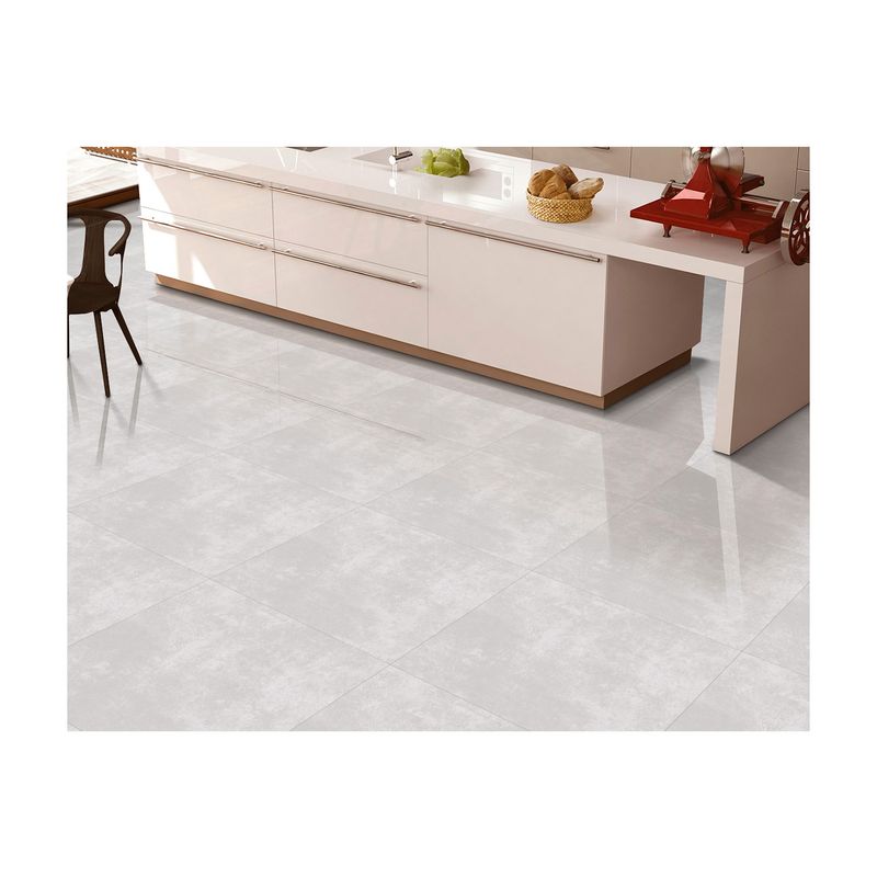 Porcelanato 60x60 California bianco mate rect SINSA, ambientado en piso de cocina con muebles blancos y encimera