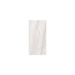 Baldosa 59.3x119 Naica gris mármol satinado rect Porcelanite, vista frontal de la pieza con vetas grises naturales