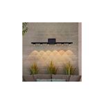Luminaria de pared al exterior LED Crucis 6 W 3000 K IP54 IK06 negro Tecnolite, instalada en pared gris con luz encendida